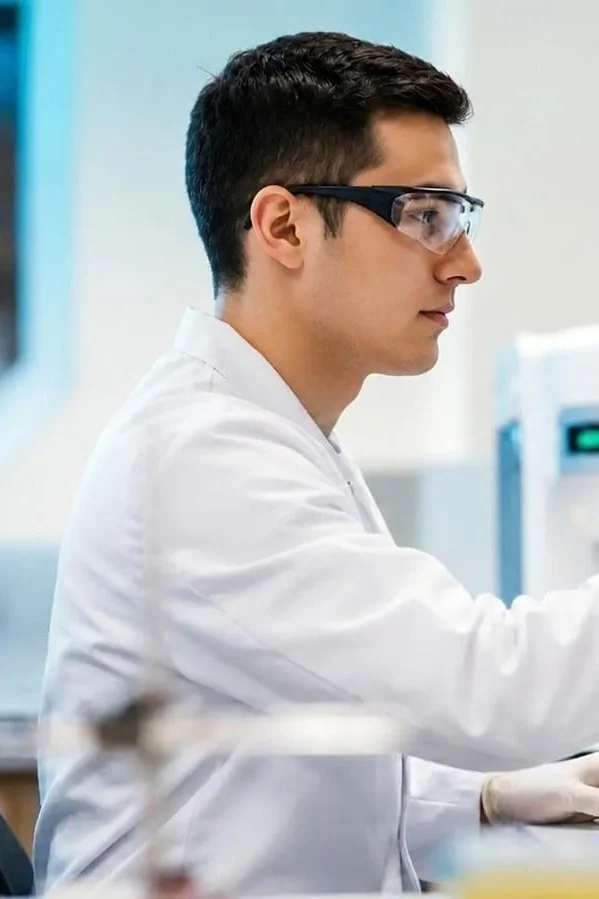 Scientist working at a lab monitor